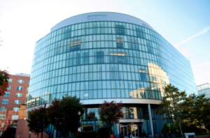 Exterior view of Behrakis health sciences center, looking upwards