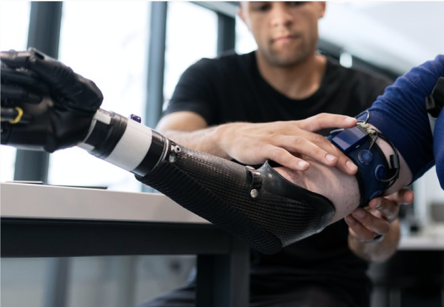 Patient being fitted with a robotic prosthetic arm at Northeastern University