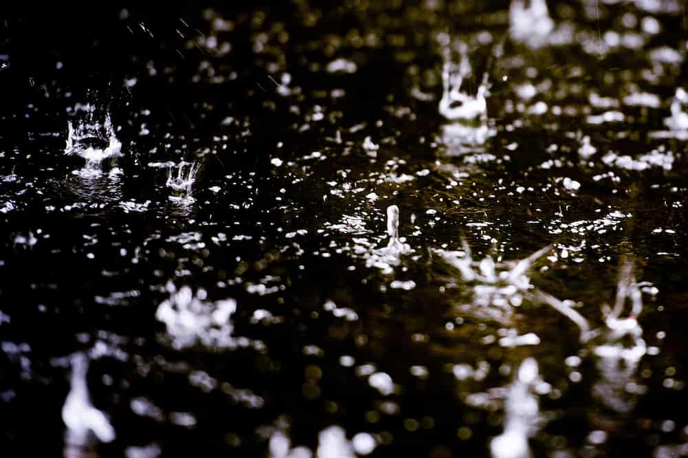Rain water splashing onto the ground