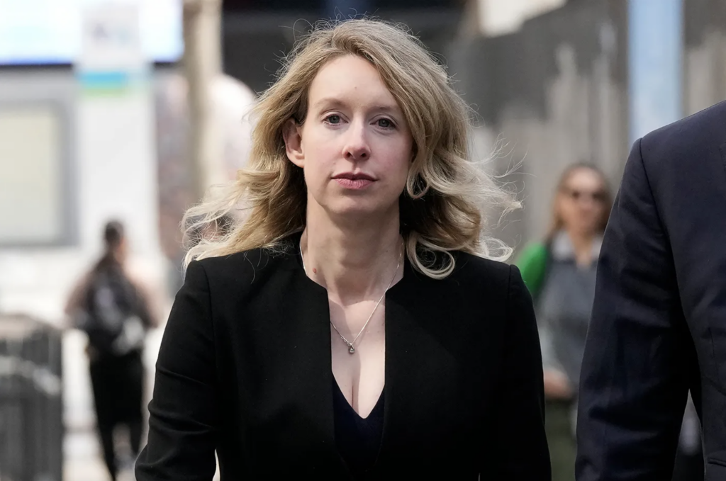 Former Theranos CEO Elizabeth Holmes leaves federal court in San Jose, Calif., Friday, March 17, 2023. AP Photo/Jeff Chiu
