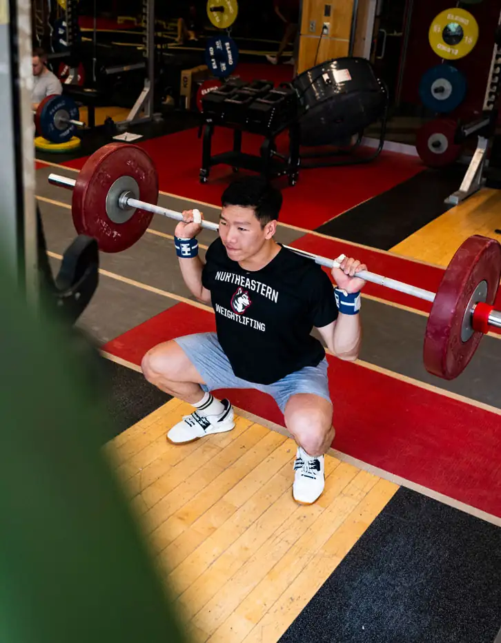 Matt Tung lifting weights