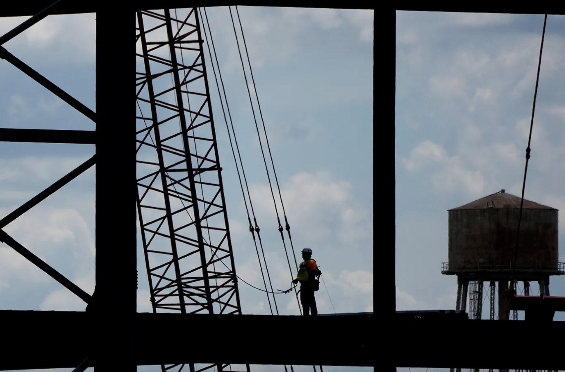 New research from Northeastern on tradeoff between public health and the economy in a pandemic says shutting down construction jobs only marginally reduces infection rates but has a large negative impact on the economy. AP Photo/Charlie Riedel