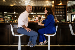 Northeastern graduates Christina and Ken Procaccianti work in the Providence location of Green Line Apothecary, a pharmacy and vintage soda fountain company they founded together in Wakefield, Rhode Island in 2016. Photo by Alyssa Stone/Northeastern University