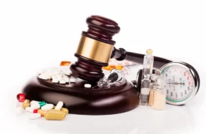 Judge's gavel with drugs around it