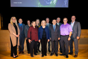 2023 Webb Lecture Award Ceremony recognizing Deborah Simonson From right to left: Steve Rough, William Churchill, Charles Daniels (back), William Zellmer (front), Paul Bush (back), Linda Tyler (front), Marianne Ivey (back), Karol Wollenburg (front), Patricia Kienle (back), Kevin Colgan (back), Deborah Simonson all past John W Webb award winners