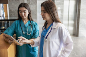 Couple of doctors talking in the hospital corridor