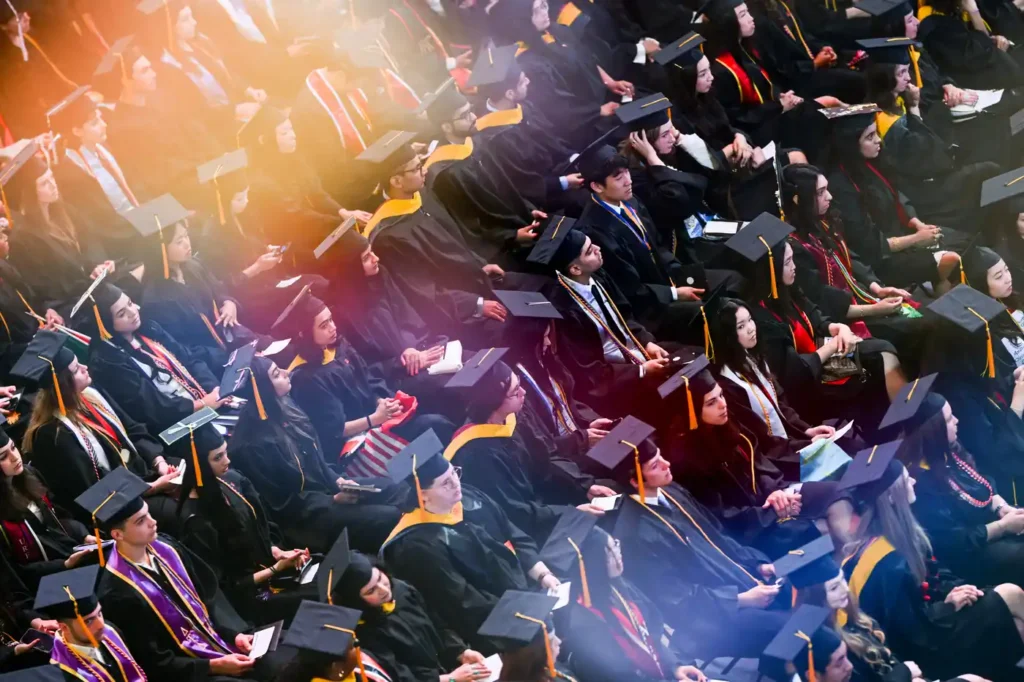 Overhead photo of graduates sitting in their seats at the Bouvé College Celebration