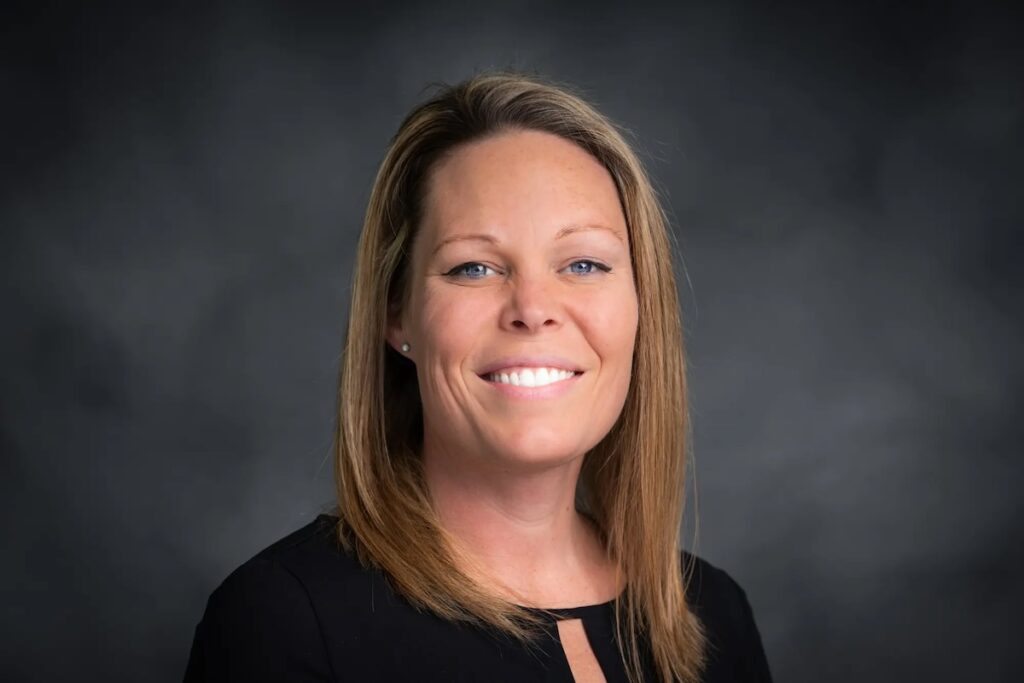 Population Health PhD alumna Dr. Kate Saltus poses for a photo.