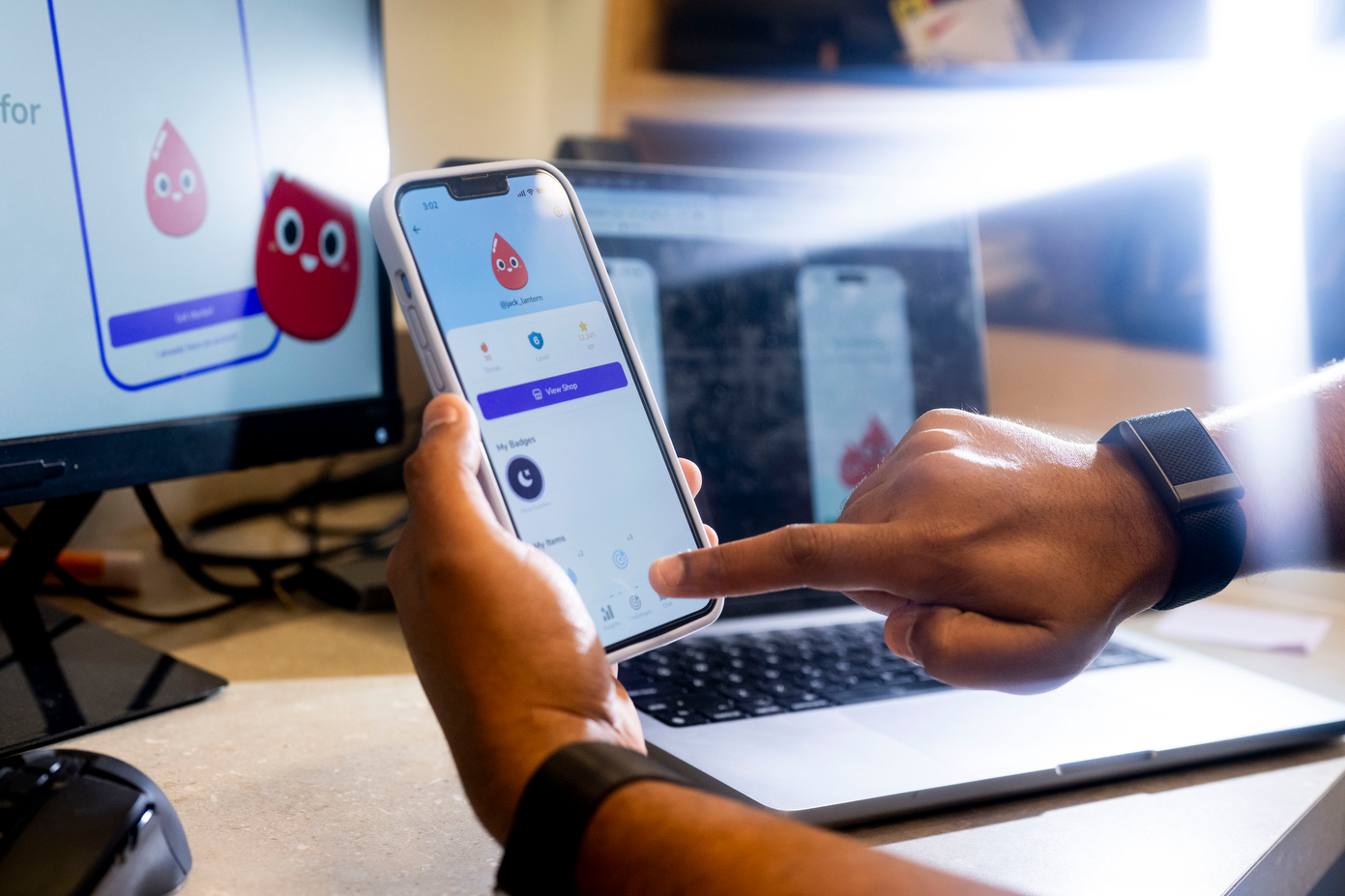 Photo of person using the Sugar Slay app on an iPhone